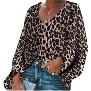 BELONGSCI, NWOT, ANIMAL PRINT TOP. LONG BALLOON SLEEVES, A-LINE BODICE. SIZE M